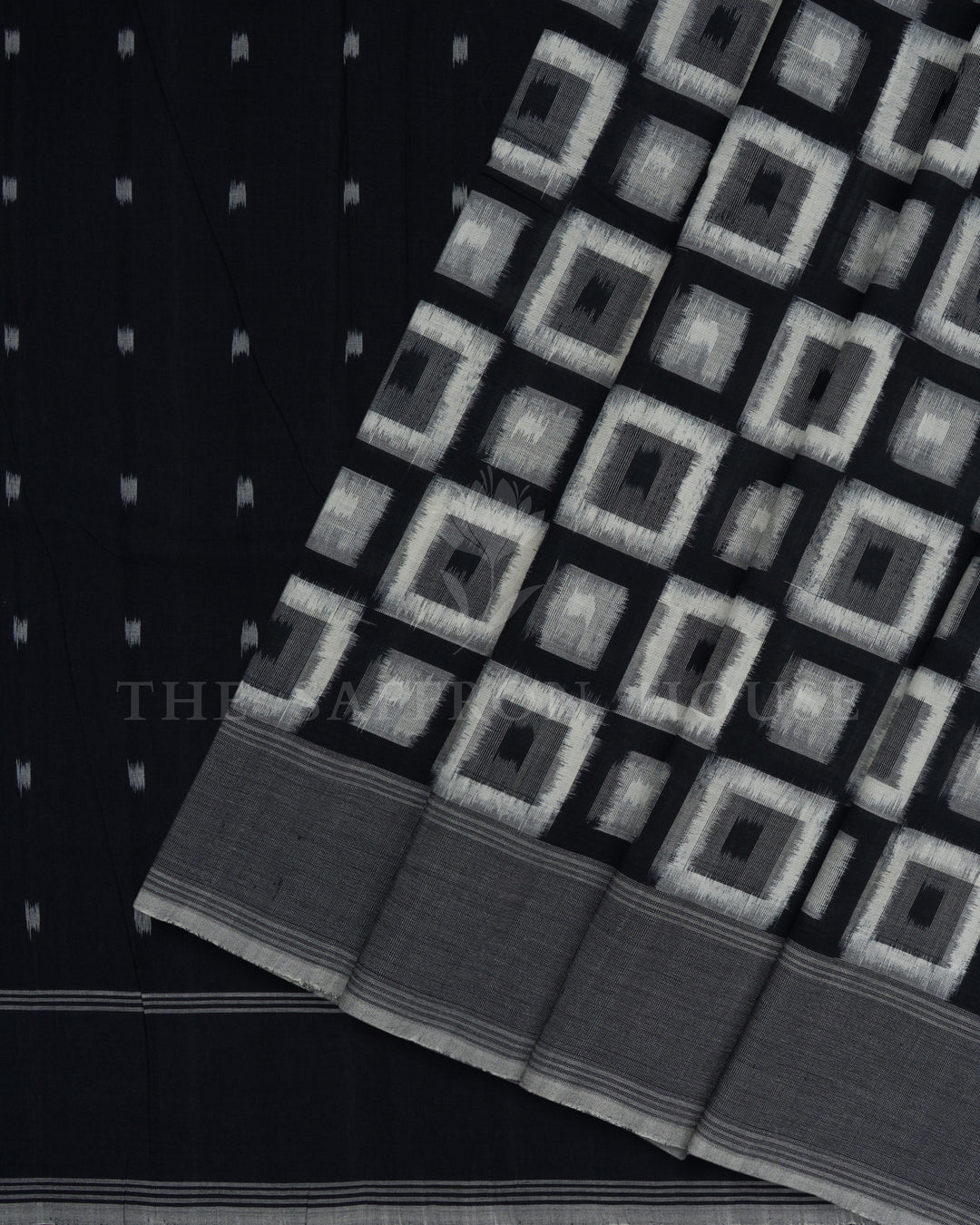 Pure White And Onyx Black Handwoven Patola Saree – The Saffron House