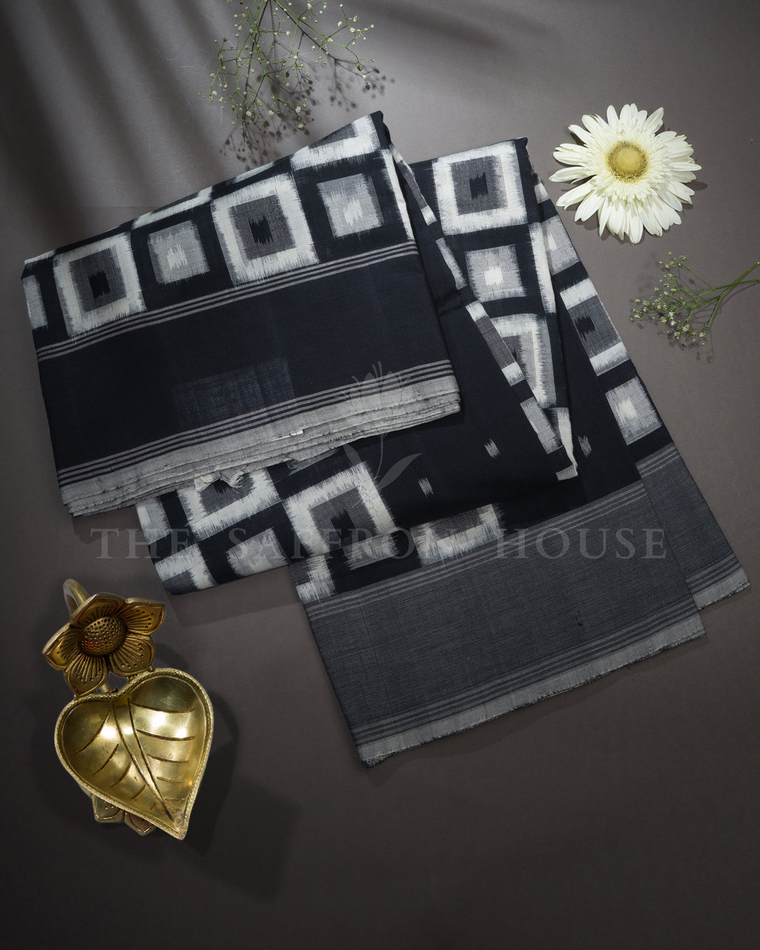 Pure White And Onyx Black Handwoven Patola Saree – The Saffron House