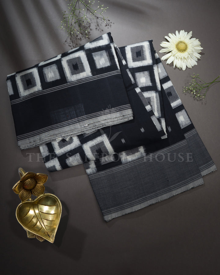 Pure White And Onyx Black Handwoven Patola Saree – The Saffron House