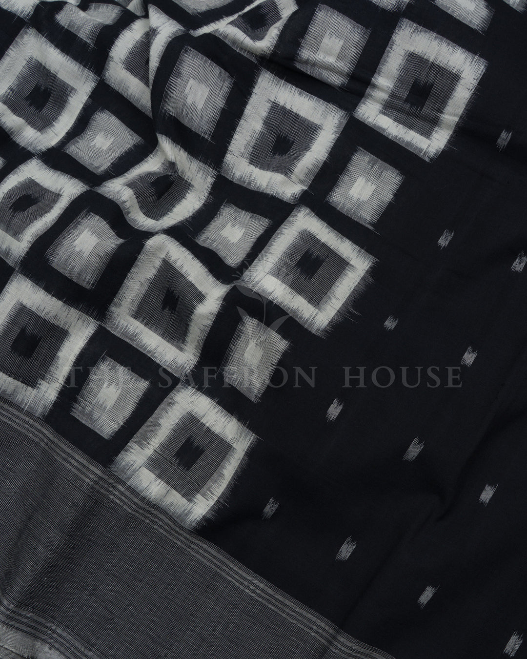 Pure White And Onyx Black Handwoven Patola Saree – The Saffron House