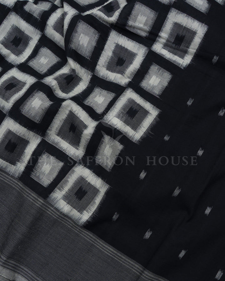 Pure White And Onyx Black Handwoven Patola Saree – The Saffron House