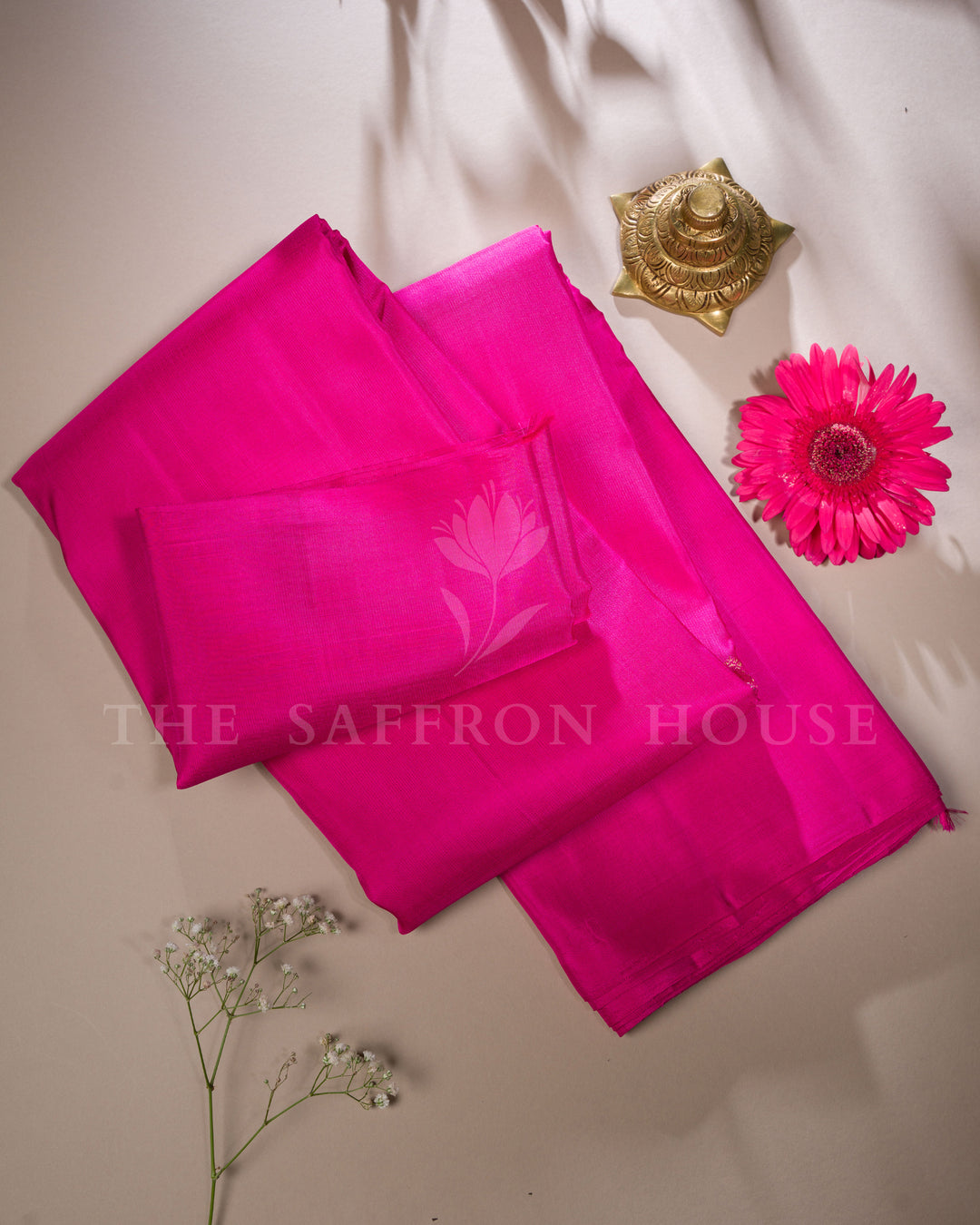 Rani pink handloom borderless Kanjivaram silk saree from The Saffron House, showcasing intricate weaving and rich silk fabric.